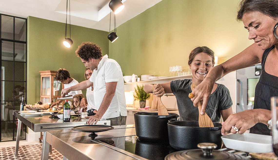 Filipa Fortunato cooking with her family